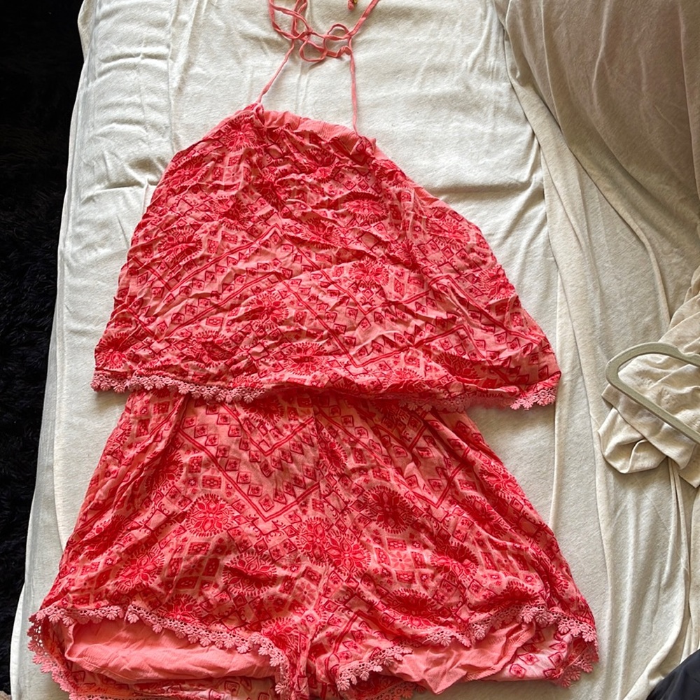Romper from guess. Cute and comfortable size medium